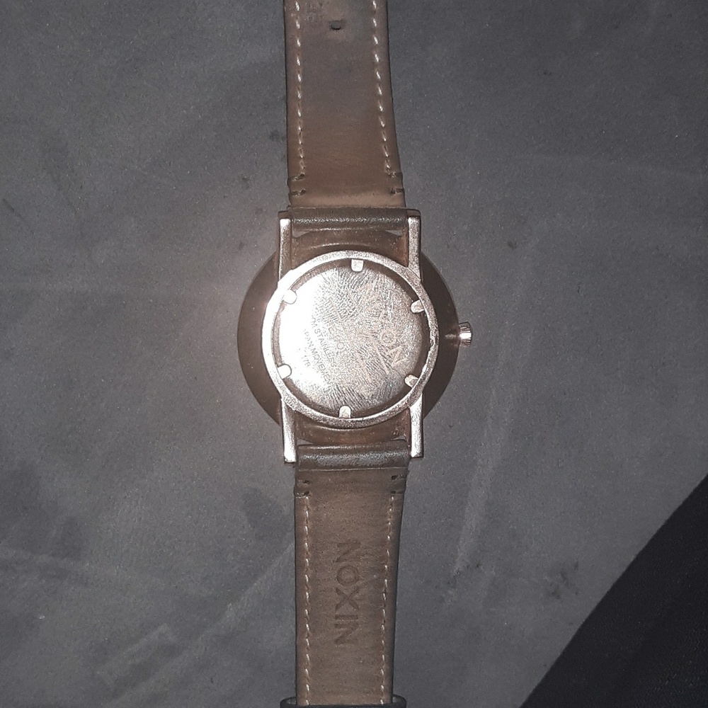Nixon rosegold and leather watch